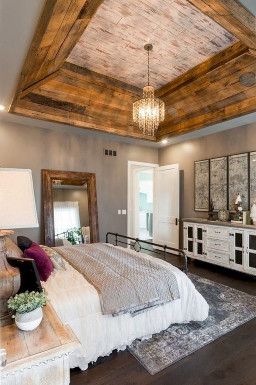 Bedroom with barnwood ceiling using wood
