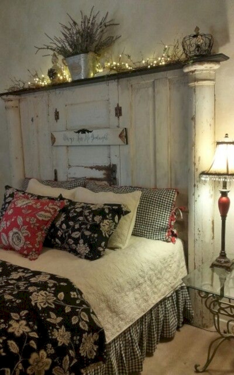 Bedroom with old doors headboard