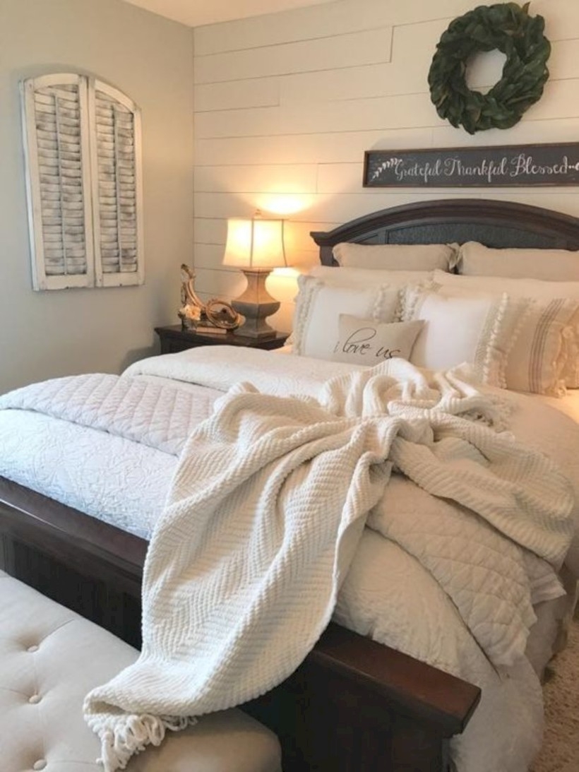 Bedroom with shiplap wall