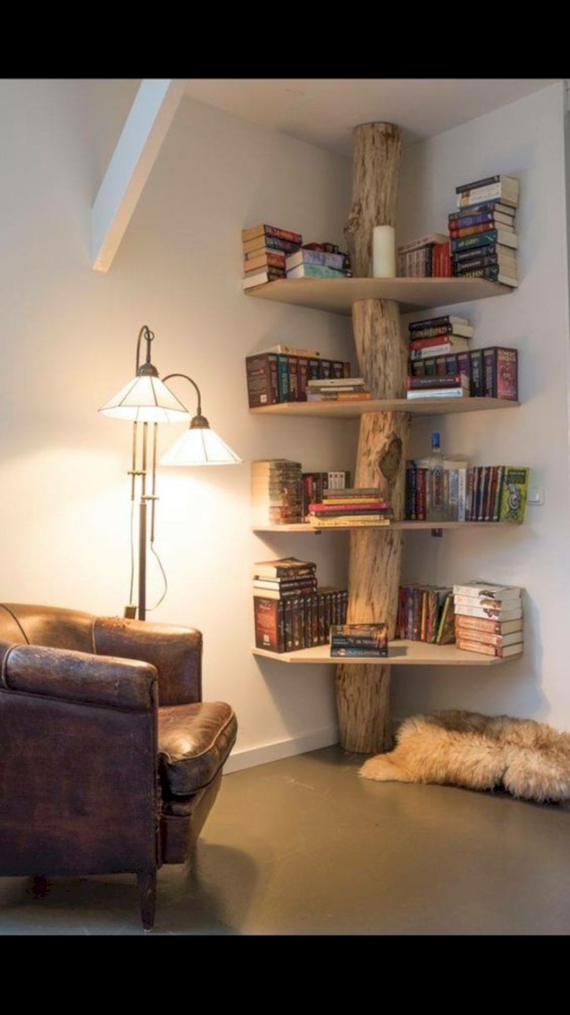 Bookshelf teamed with floor lamp and leather armchair