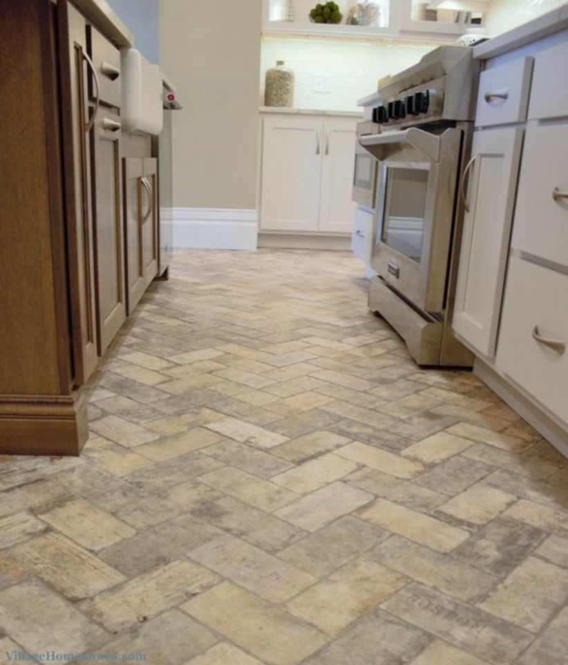 Brick tiled flooring installed in a remodeled historic kitchen