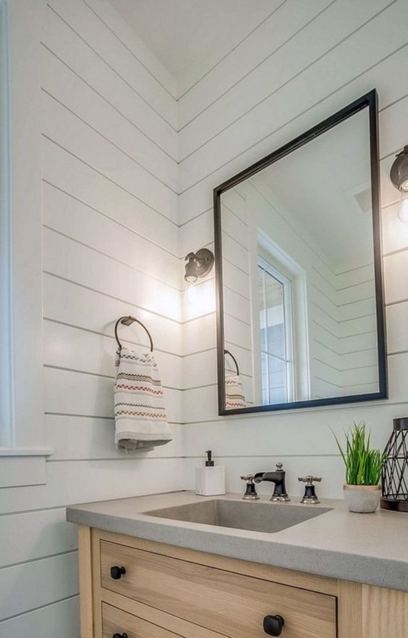 Farmhouse bathroom shiplap paneling white oak vanity concrete countertop with integrated sink and metal mirror