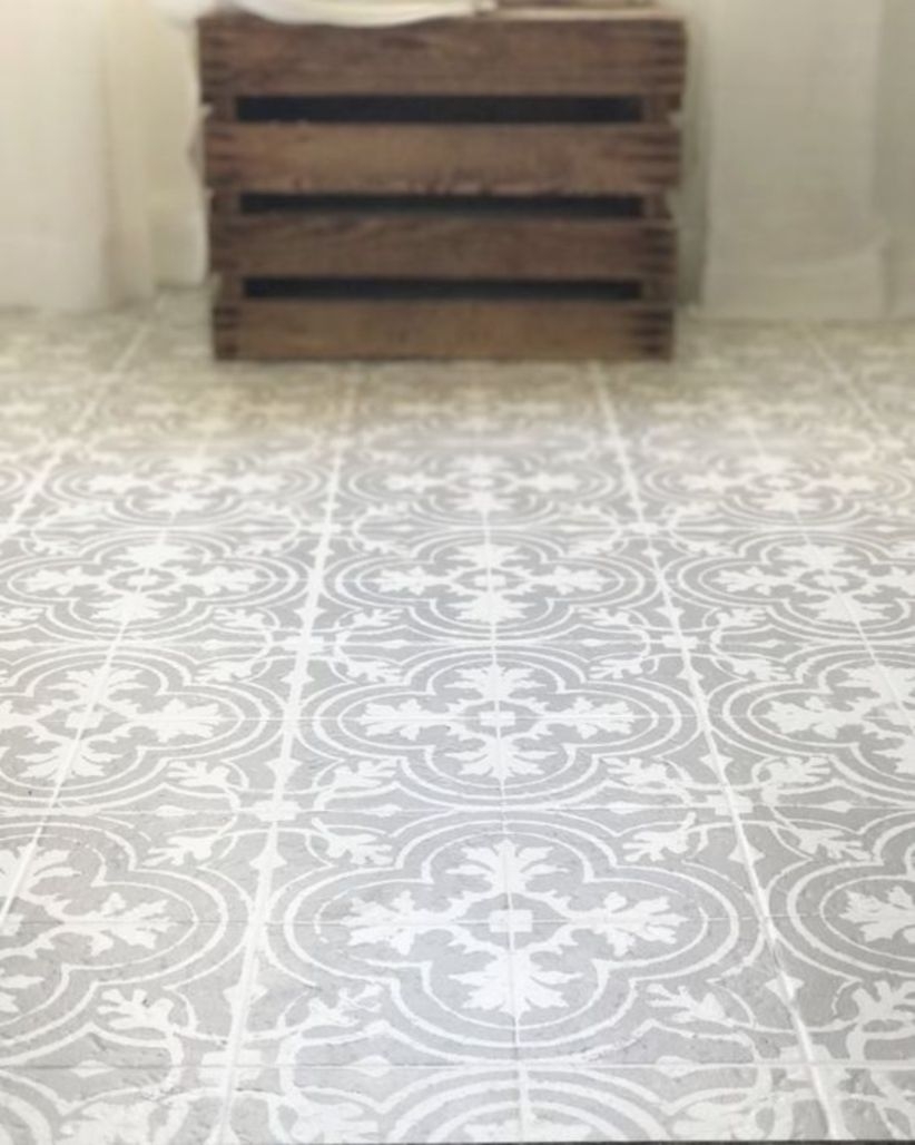 Paint your linoleum or tile floors to look like patterned cement