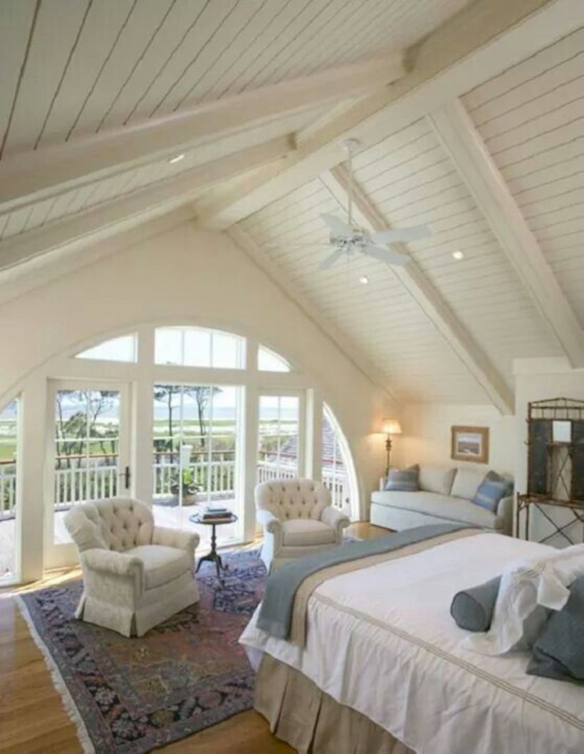 A country bedroom with the a frame ceiling