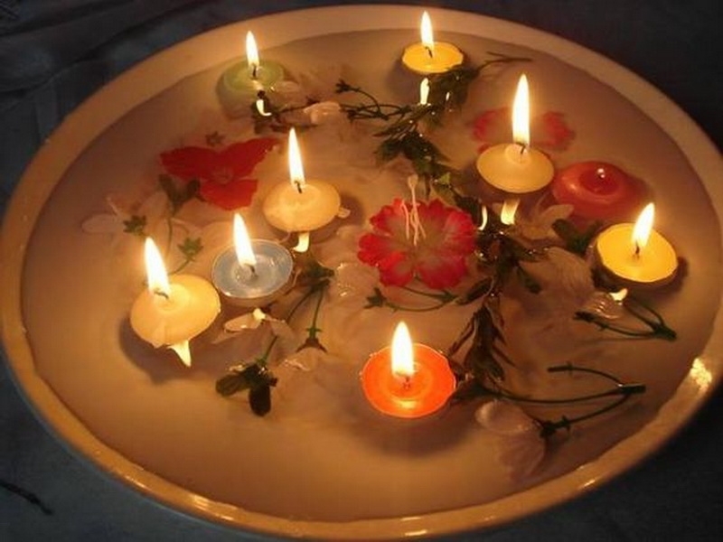 5. floating candles on the water