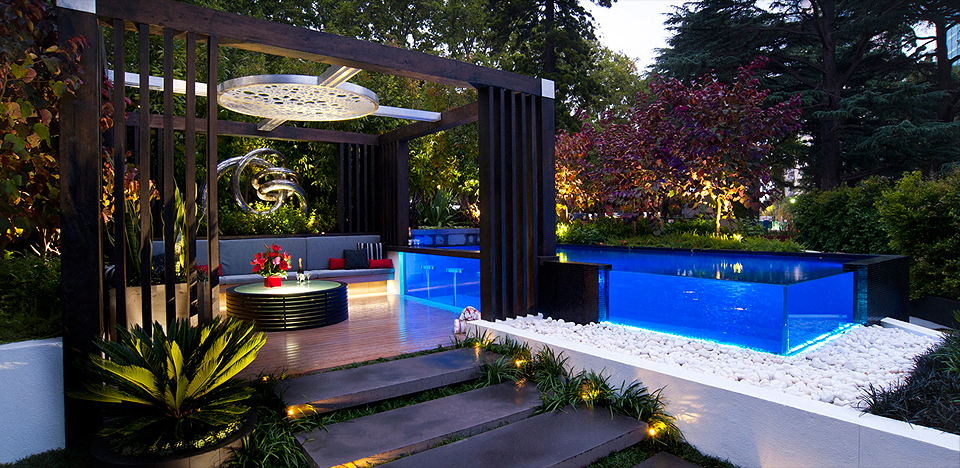 3. combination of pool with garden in backyard