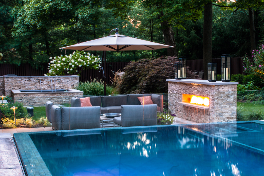 6. modern pool with fireplace
