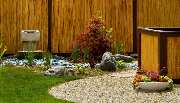 Japanese garden with bamboo fence