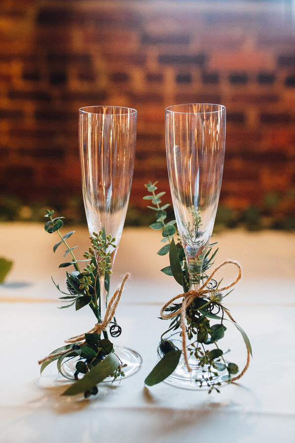 Bride and groom glasses with herbs