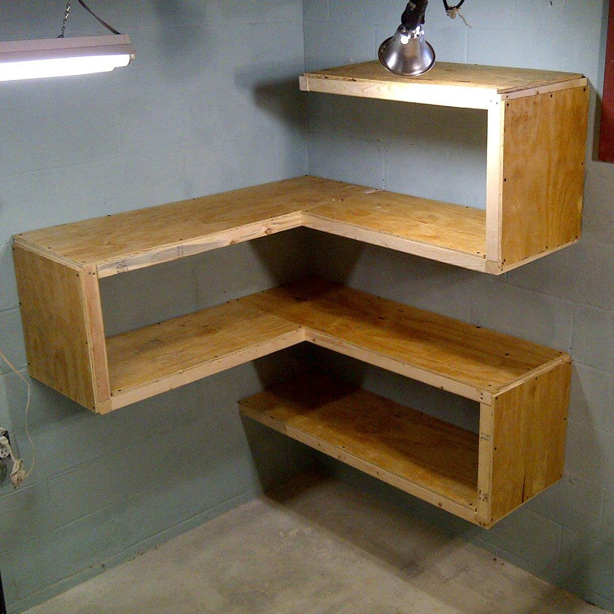 An awesome plywood furniture with flowing lines and interesting curves at the corner for bookshelves and storage