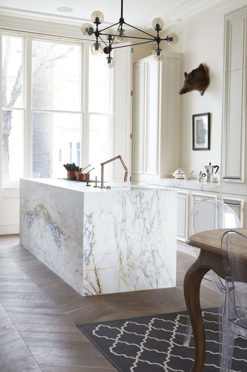 Best white kitchen with white kitchen island table, white walls, large white windows that make it bright