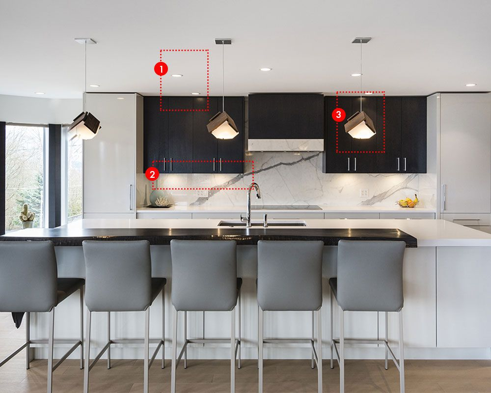 Modern kitchen lighting ideas with island-highlighting pendants, under-cabinet leds-will and led lamp on the ceiling
