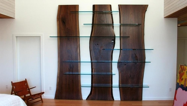 Nature elements furniture with slabs of wood combined with glass shelving to complete your natural living room
