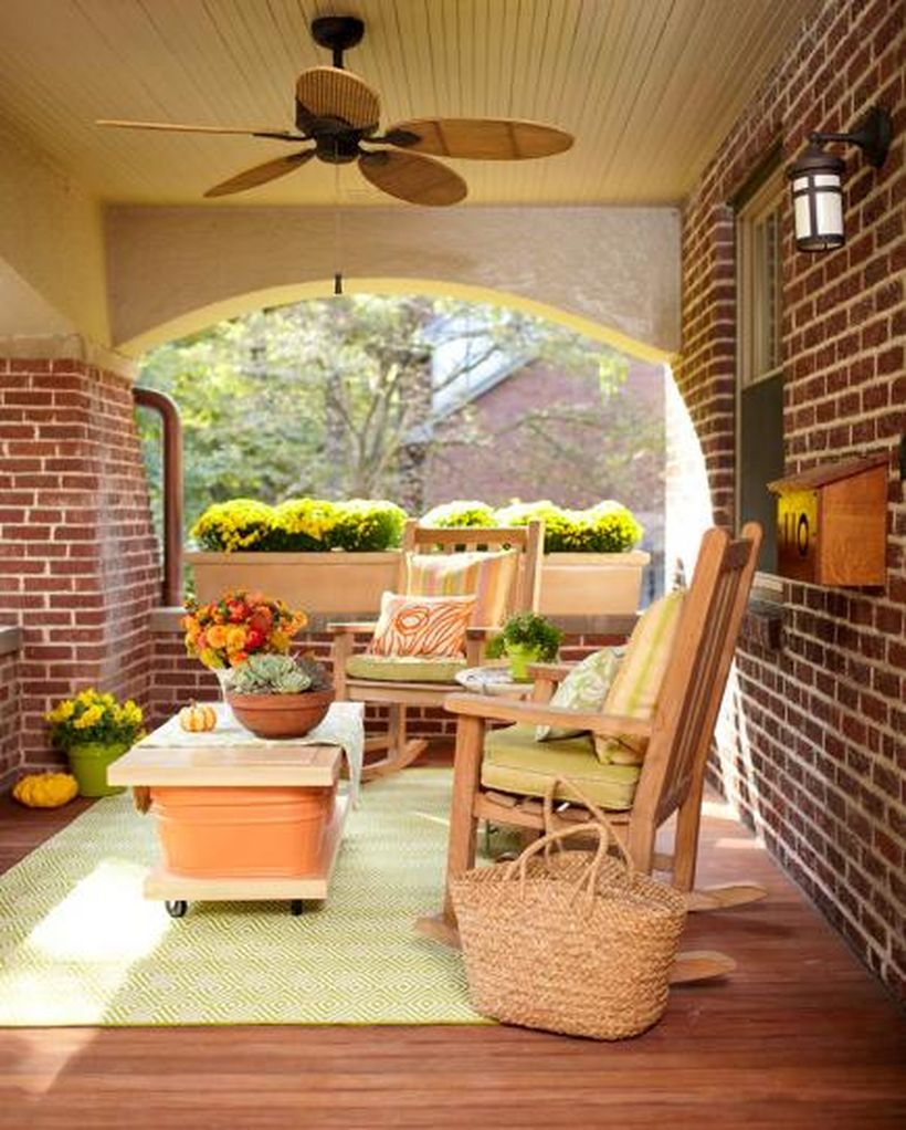 An amazing seating ideas with wooden chairs, pillows, square wooden and green carpet