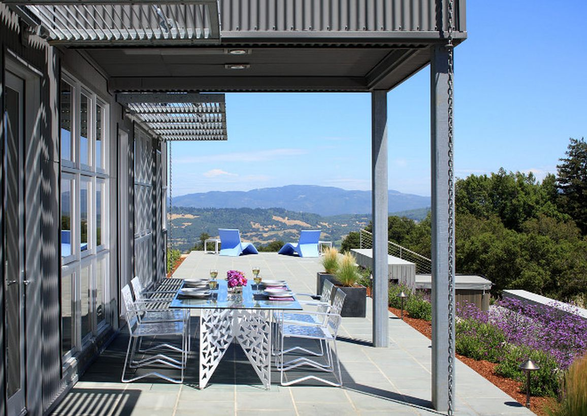 An awesome farmhouse porch furniture with small glass chairs to create more beauty