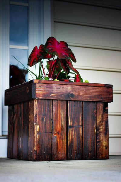 An amazing dark stained wood diy planter box to perfect your home decoration