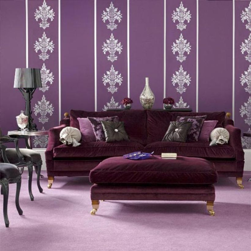 An interesting home paint colors with mauve wall is perfectly expressed for the living room, luxurious velvet sofas, and patterned wallpaper