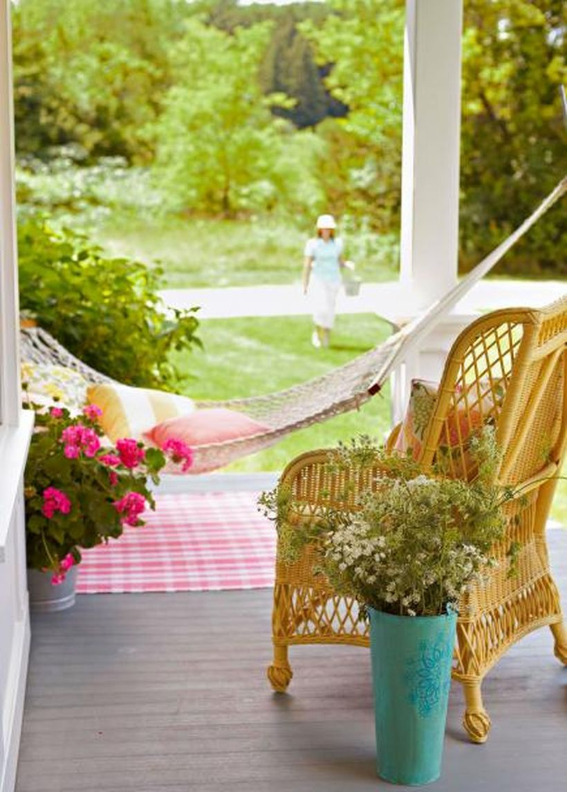 Cozy seating ideas with rattan chair, swing and pillows