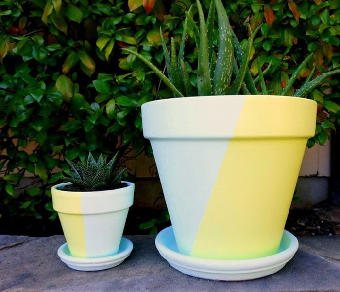 Creative clay pot design with two-toned painted pots to perfect your garden