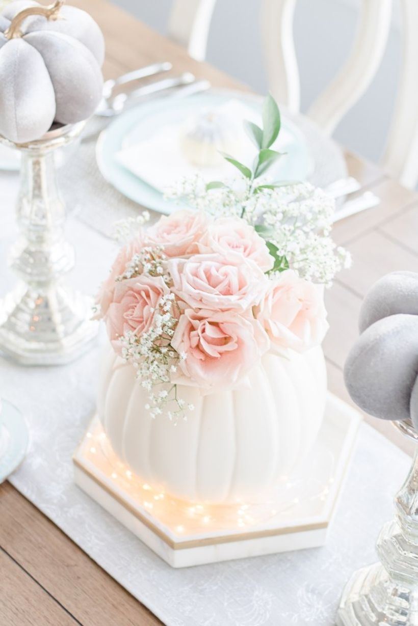 Pretty white pumpkin and pink flowers centrepiece ideas