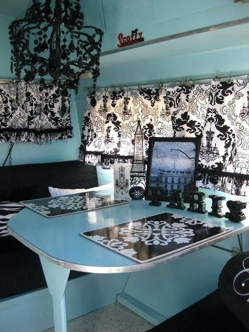Stunning framed picture and black iron tower combined with word board