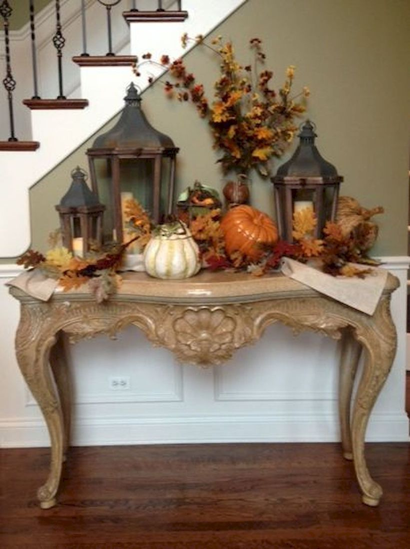 Decorating pumpkins and jars to create impression