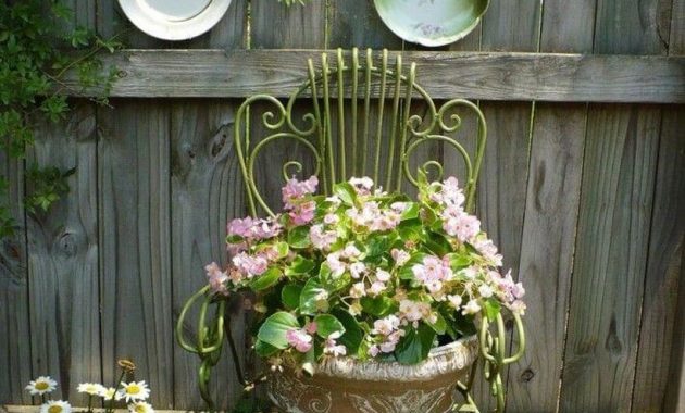 Vintage-planter-garden-ideas-with-concrete-pots-with-unique-shapes-and-antique-iron-chairs-as-a-buffer