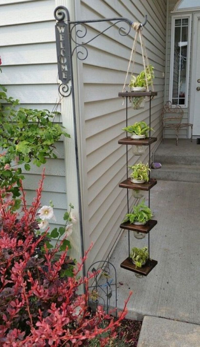 Charming outdoor hanging planters ideas to brighten your yard 04