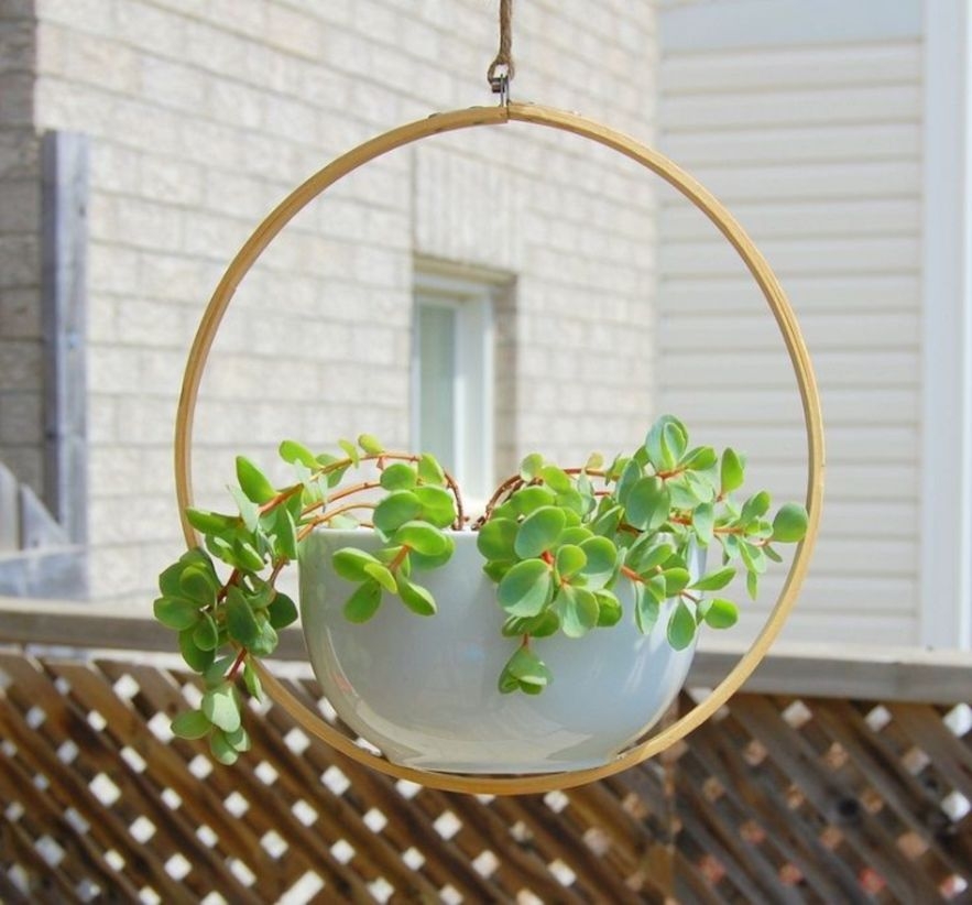 Charming outdoor hanging planters ideas to brighten your yard 06