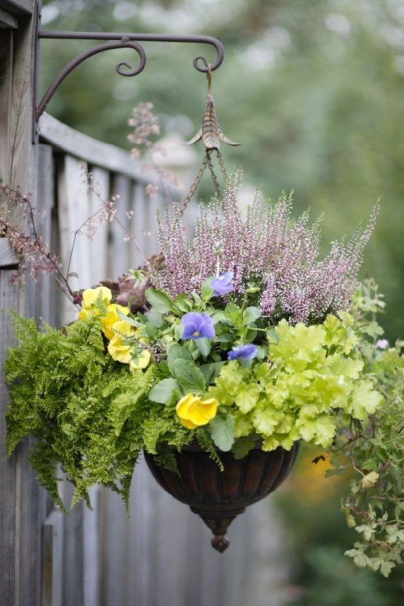 Charming outdoor hanging planters ideas to brighten your yard 19