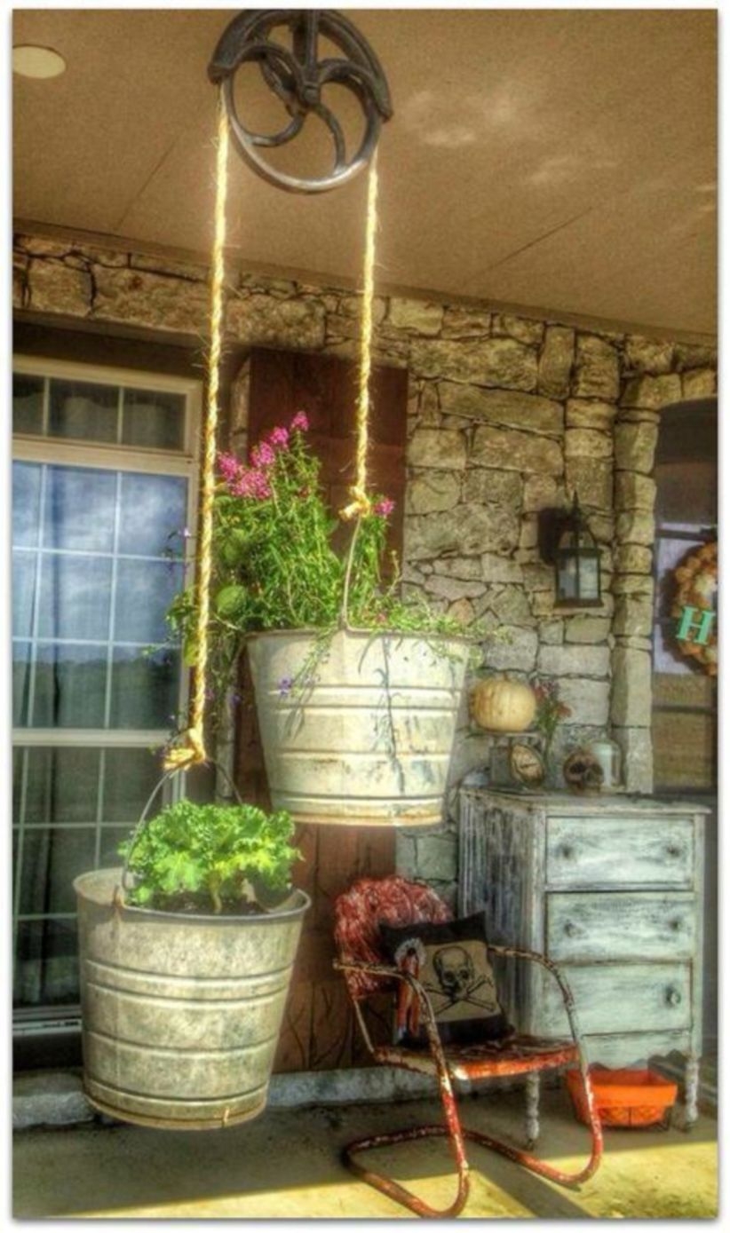 Charming outdoor hanging planters ideas to brighten your yard 41