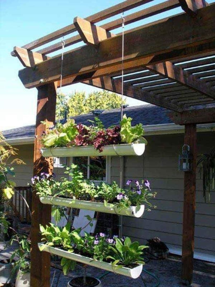 Charming outdoor hanging planters ideas to brighten your yard 42