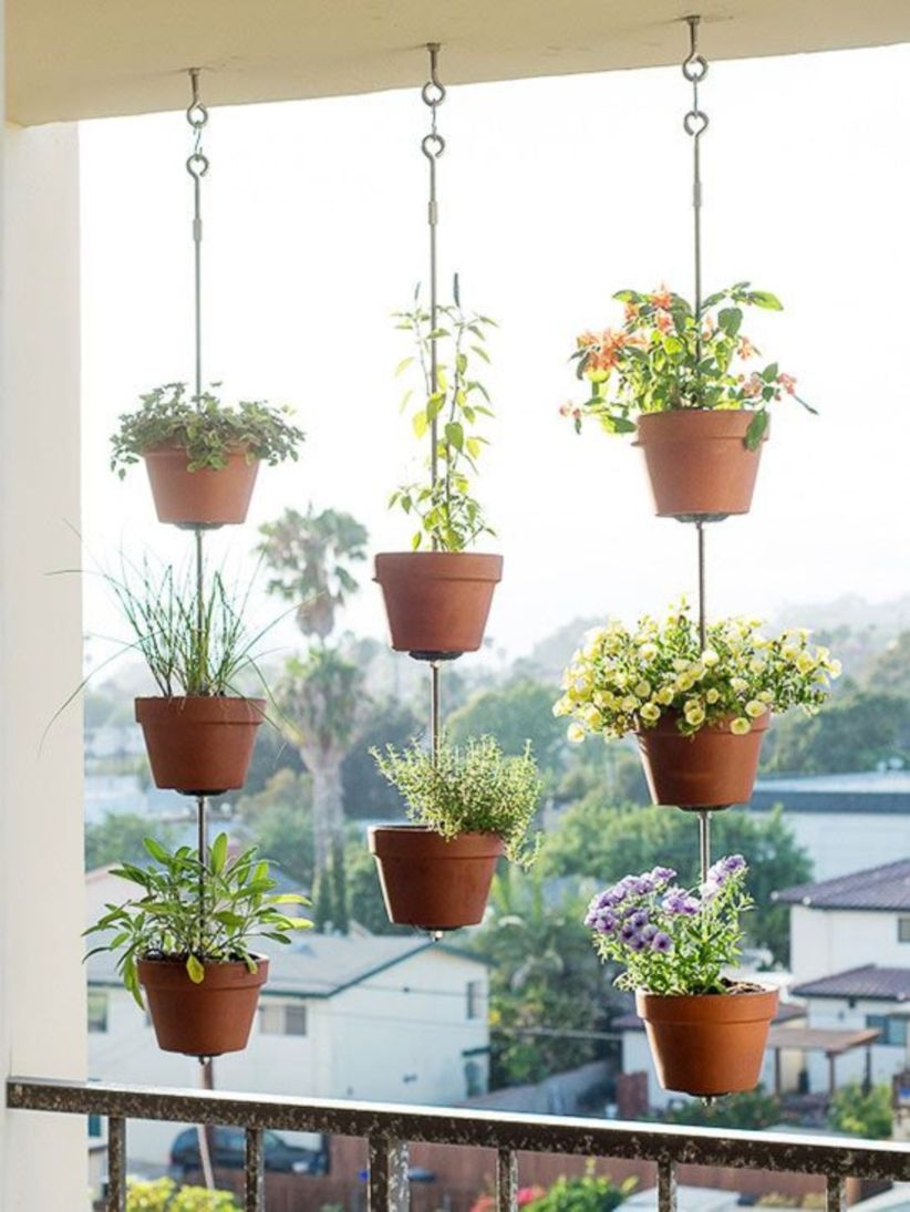 Charming outdoor hanging planters ideas to brighten your yard 43