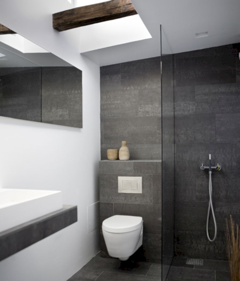 Nice and minimalist bathroom with the glass wall with a concrete 09