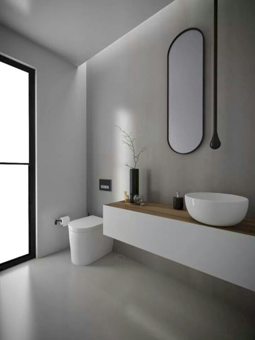 Nice and minimalist bathroom with the glass wall with a concrete 12