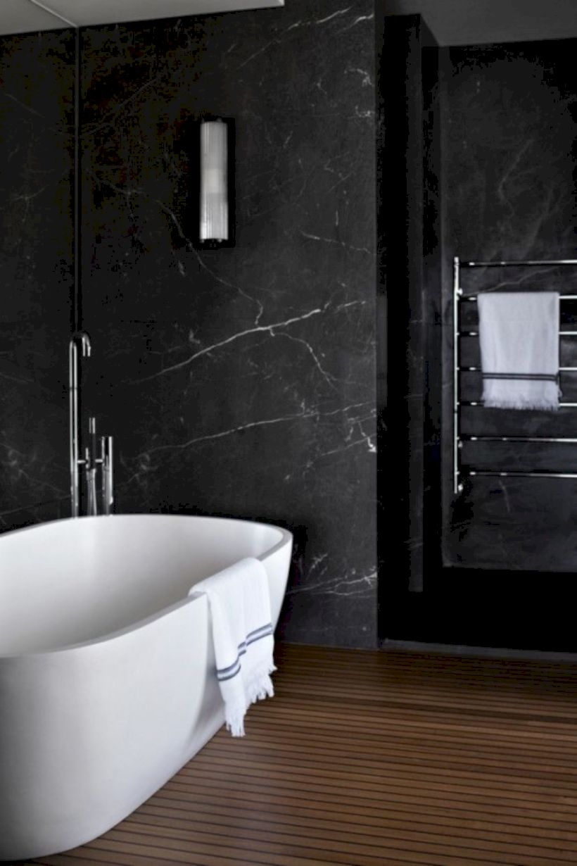 Nice and minimalist bathroom with the glass wall with a concrete 20