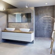 Nice and minimalist bathroom with the glass wall with a concrete 28