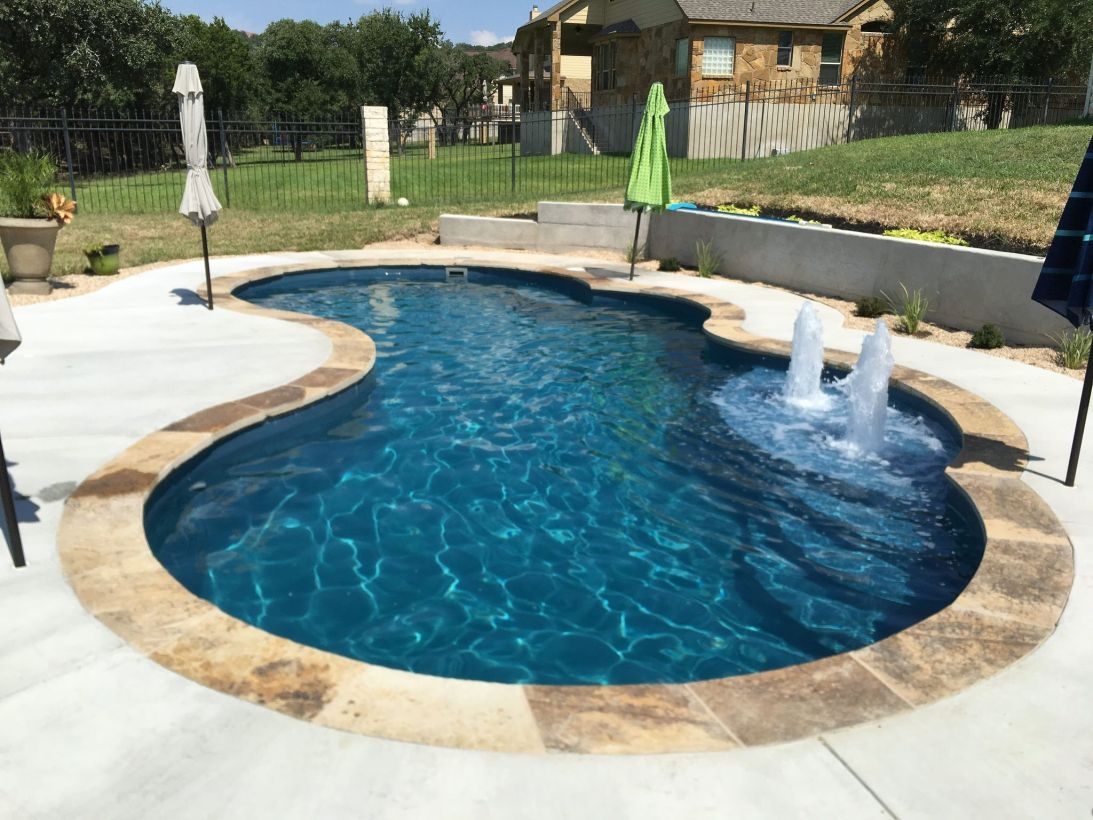 Pool waterfalls ideas for your outdoor space 07