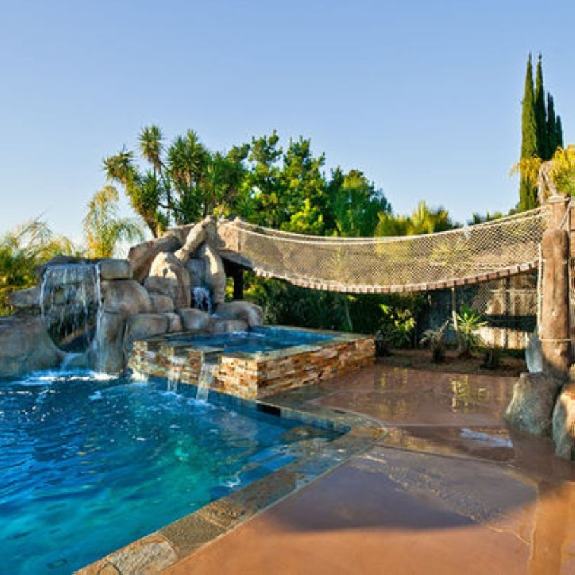 Pool waterfalls ideas for your outdoor space 08