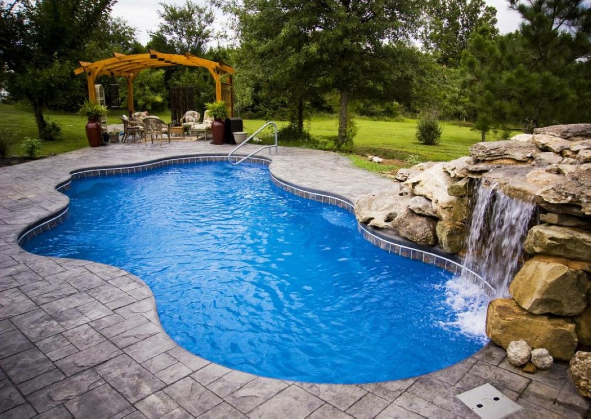 Pool waterfalls ideas for your outdoor space 09