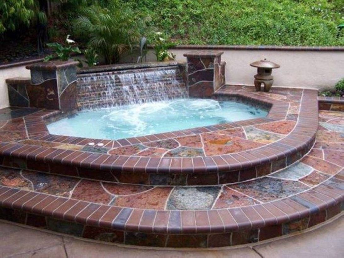 Pool waterfalls ideas for your outdoor space 10