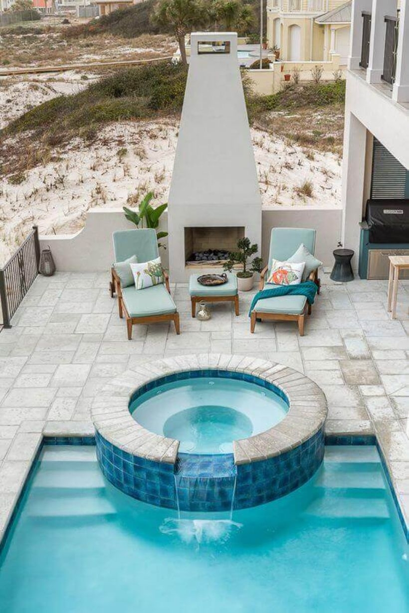 Pool waterfalls ideas for your outdoor space 12