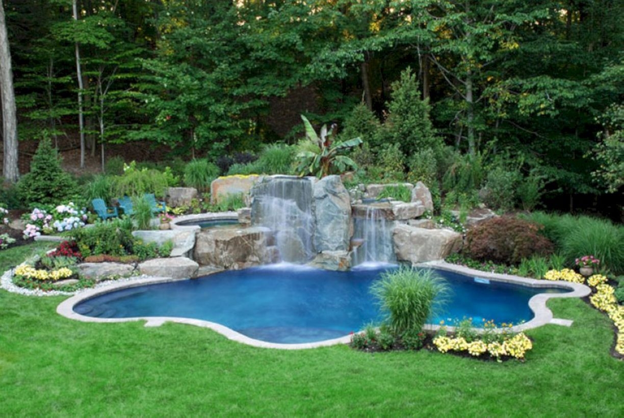 Pool waterfalls ideas for your outdoor space 16