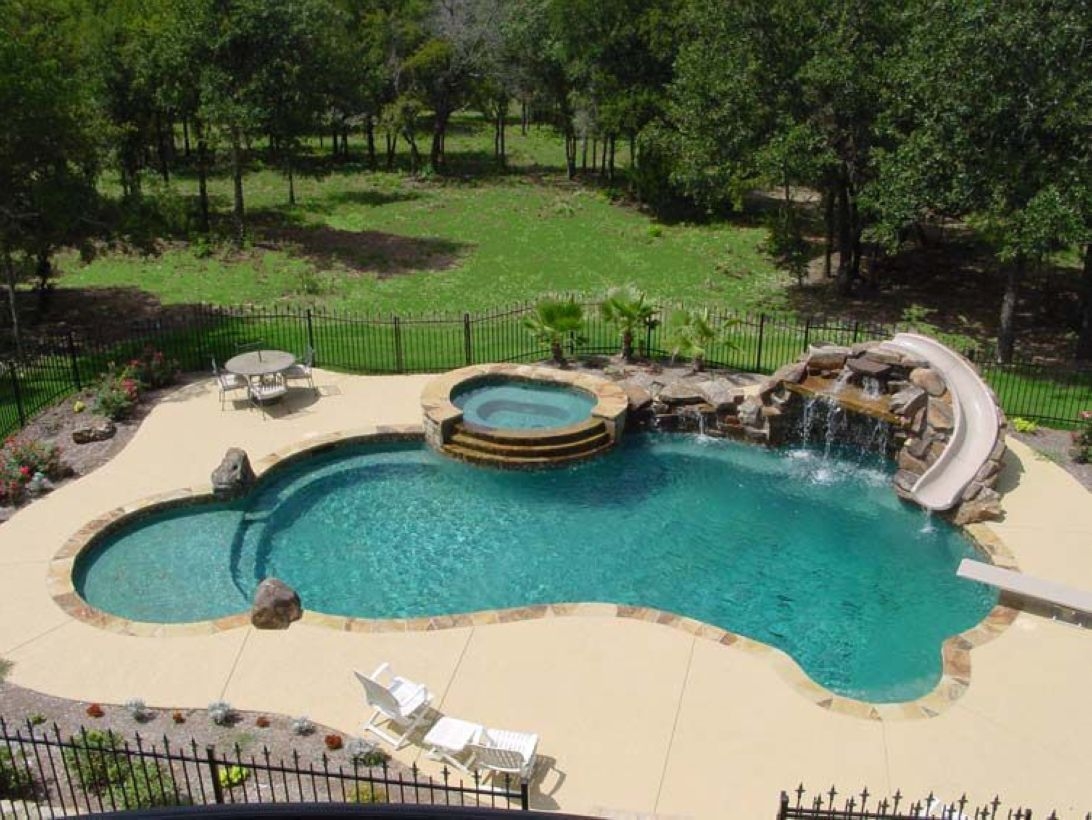 Pool waterfalls ideas for your outdoor space 22