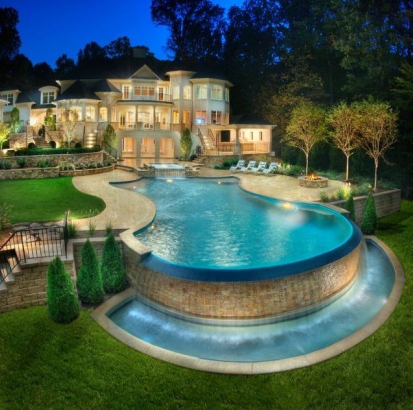 Pool waterfalls ideas for your outdoor space 33