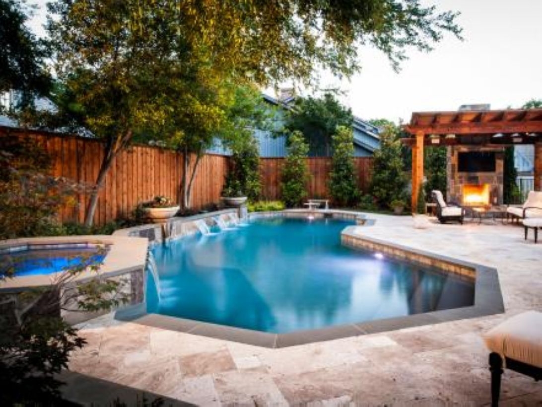 Pool waterfalls ideas for your outdoor space 34
