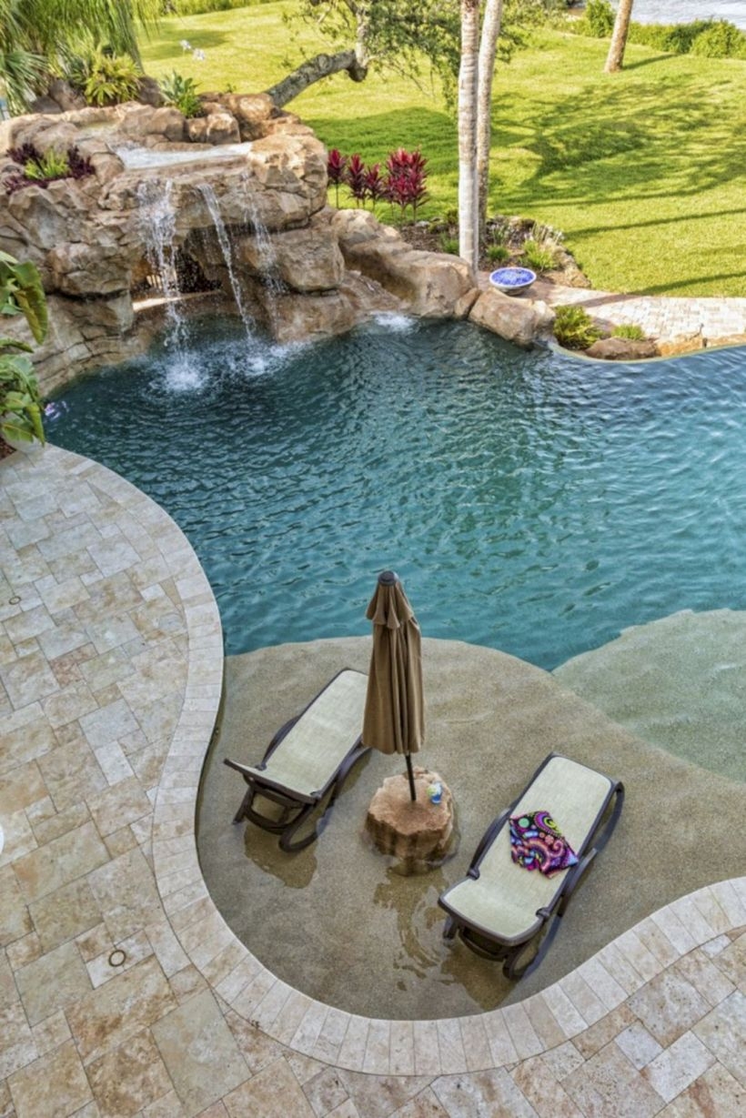 Pool waterfalls ideas for your outdoor space 38