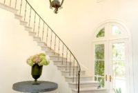 Ways to decorate with chandelier over the stairs 44