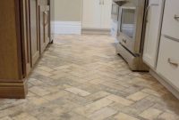 Brick tiled flooring installed in a remodeled historic kitchen