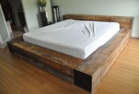 King size pallet bed frame with low headboard and comfy oversized mattress